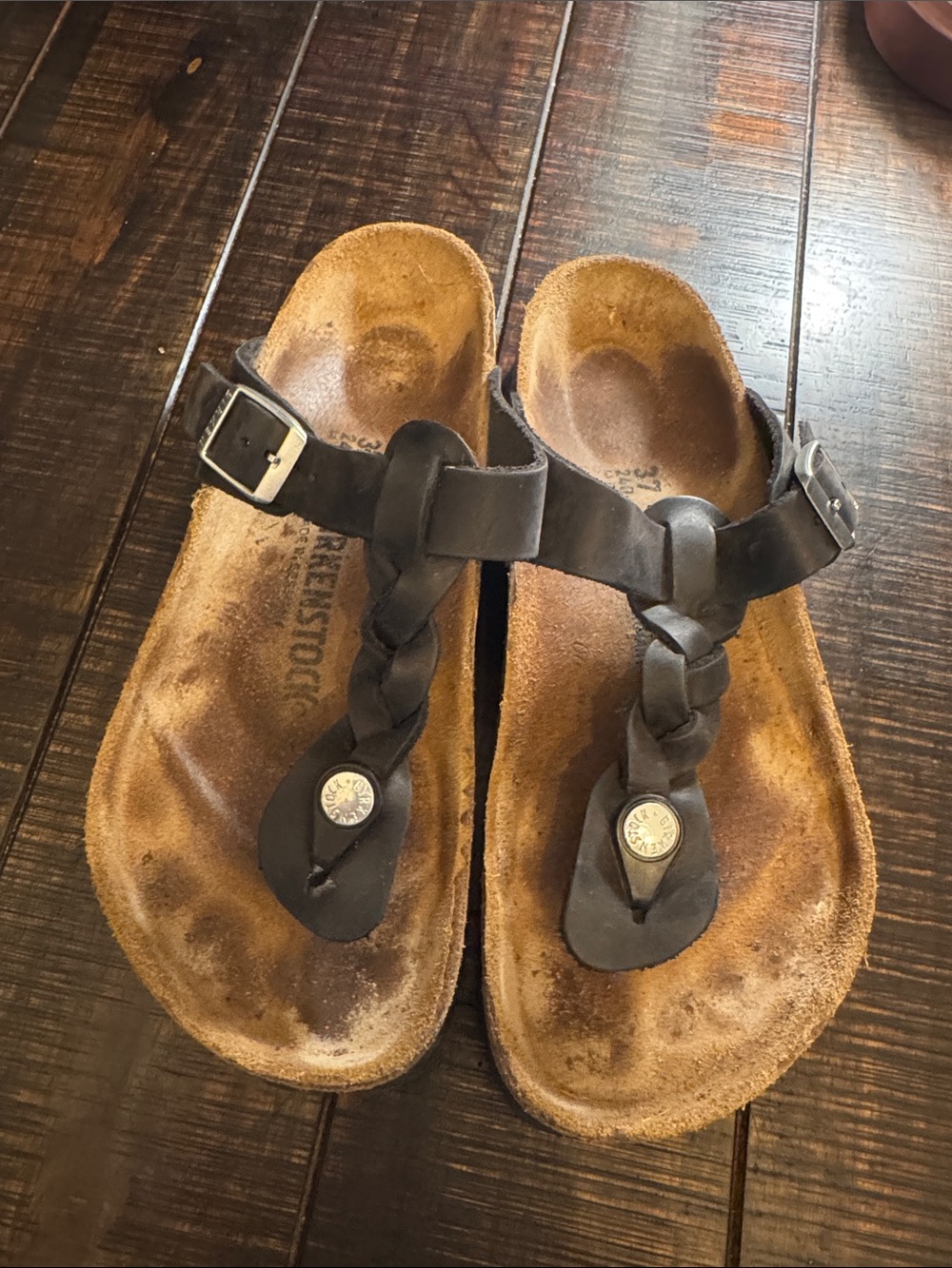 Birkenstock’s Braided Leather Toe-Post 
Birkenstock Sandals in black with silver